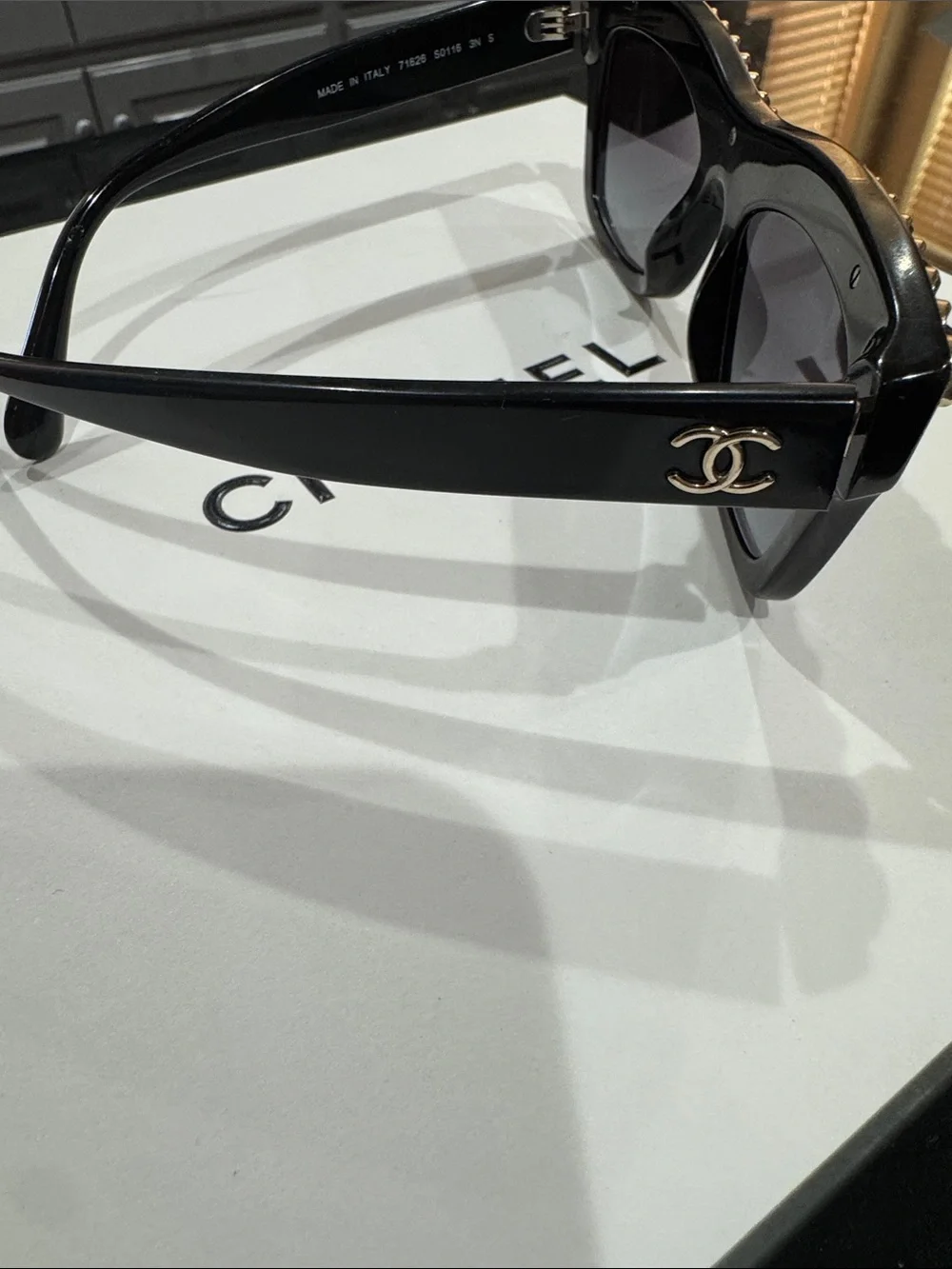 CHANEL Black Cat-Eye Sunglasses with Gold Chain Trim